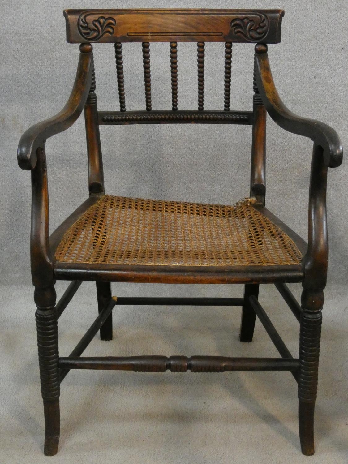 A Regency beech framed and painted caned seated armchair and a similar armchair (damaged as - Image 2 of 10
