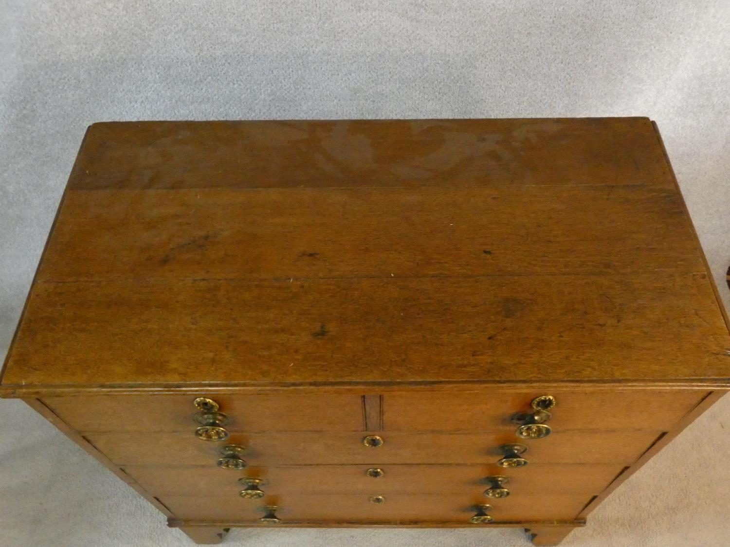 An early 19th century light oak chest of two short over three long drawers fitted with original - Image 4 of 8
