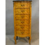 A Louis XV style burr walnut tall chest with ormolu mounts on cabriole supports. H.112 W.46 D.35cm