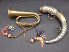 An Islamic copper, brass and white metal gun powder horn, with two hanging loops and white metal