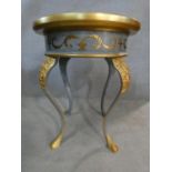 A painted lamp table with arabesque detail to the top and classical motifs to the frieze raised on