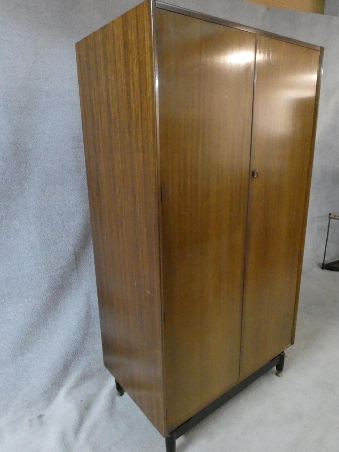 A mid century vintage teak G-Plan fitted compactum wardrobe on ebonised feet with Ebenezer Gomme - Image 6 of 15