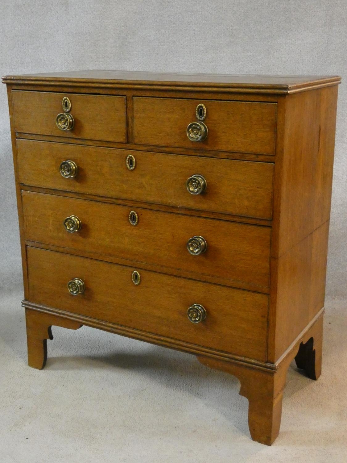 An early 19th century light oak chest of two short over three long drawers fitted with original - Image 2 of 8