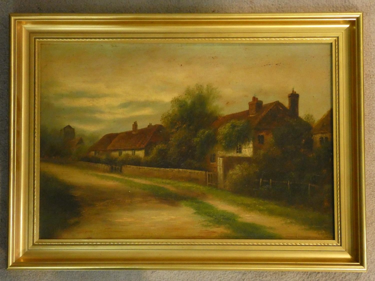 A 19th century gilt framed oil on board, rural village scene. H.51 W.71cm - Image 2 of 4