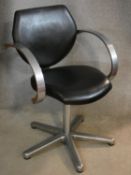 A vintage REM brushed aluminium desk chair in black leather upholstery. H.83cm