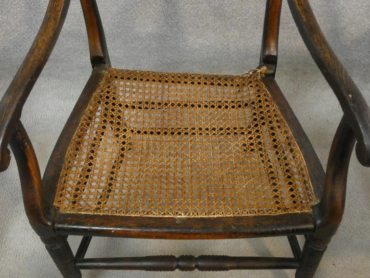 A Regency beech framed and painted caned seated armchair and a similar armchair (damaged as - Image 4 of 10