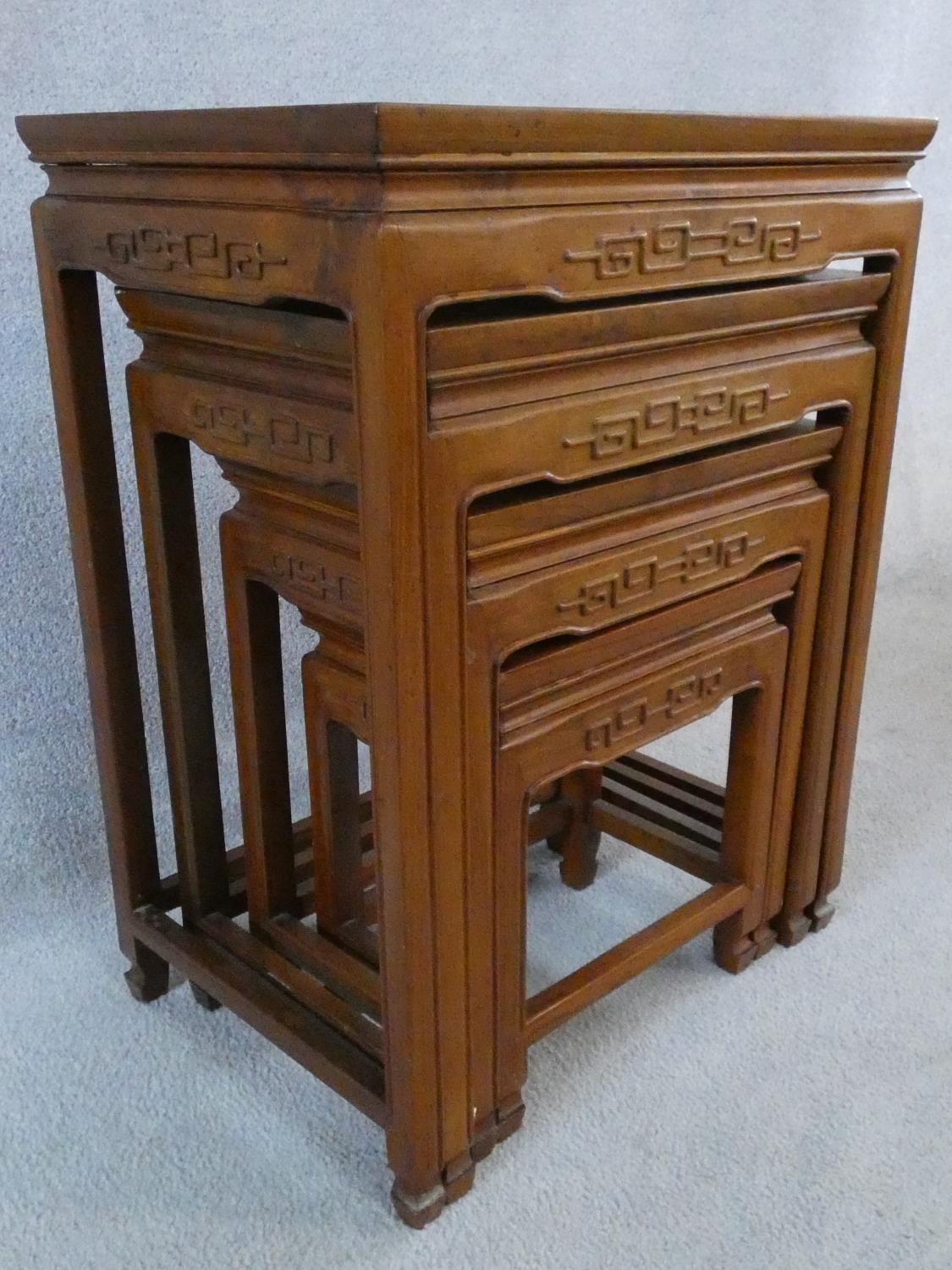 A nest of four Chinese hardwood graduating occasional tables with carved frieze on shaped - Image 10 of 11