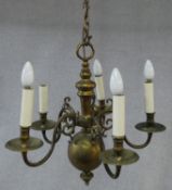 A vintage Dutch style five branch ceiling candelabra with scrolling arms. H.96 D.50cm