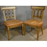 A pair of painted and gilt Continental bar back salon chairs with flechette lattice backs above