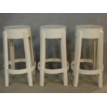 Three high stools stamped Charles Ghost by Kartell with Starck. H.66cm