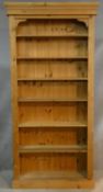 A Victorian style pine floor standing open bookcase. H.210 W.100 D.29cm