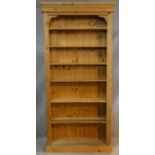 A Victorian style pine floor standing open bookcase. H.210 W.100 D.29cm