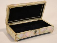 A 19th century parquetry inlaid mother of pearl jewellery casket on ivory bun feet. Missing key. H.