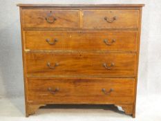 An Edwardian mahogany and satinwood with ebony inlaid chest of two short over three long drawers