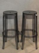 A pair of high stools stamped Charles Ghost by Kartell with Starck. tH.76cm