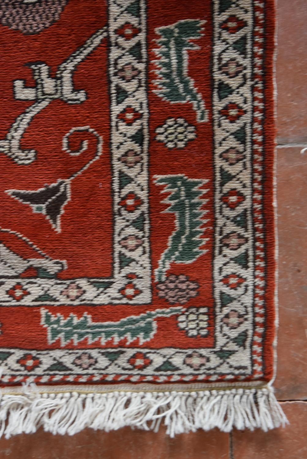 A Moughal style runner with repeating scrolling trellis central design within a border of serrated - Image 3 of 5