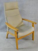 A vintage Parker Knoll, model PK 1067-70 from 1968, beech framed lounge chair. H.102cm