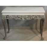 A mid century Beresford and Hicks painted console table in the William Kent style with carved