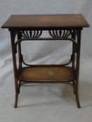 A late 19th century bentwood occasional table with fret cut and pierced frieze on swept supports
