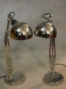A pair of vintage style chrome anglepoise desk lamps with domed shades. H.72cm
