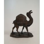 A Chinese bronze figure of a camel with a compartment under the hump with a lid pierced with