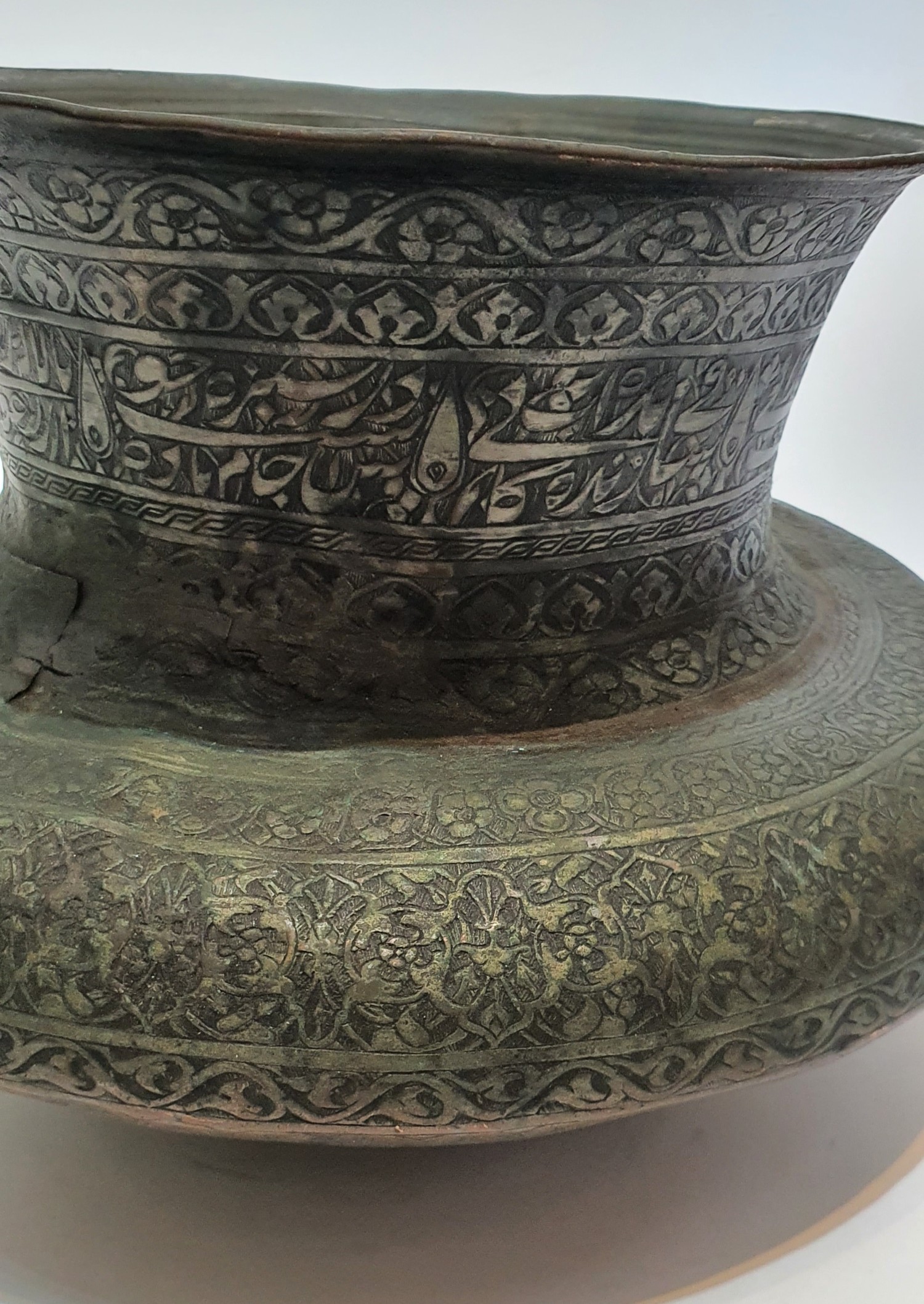 A 17th century Safavid brass vase with calligraphic engraved design. H18.5cm. - Image 3 of 5