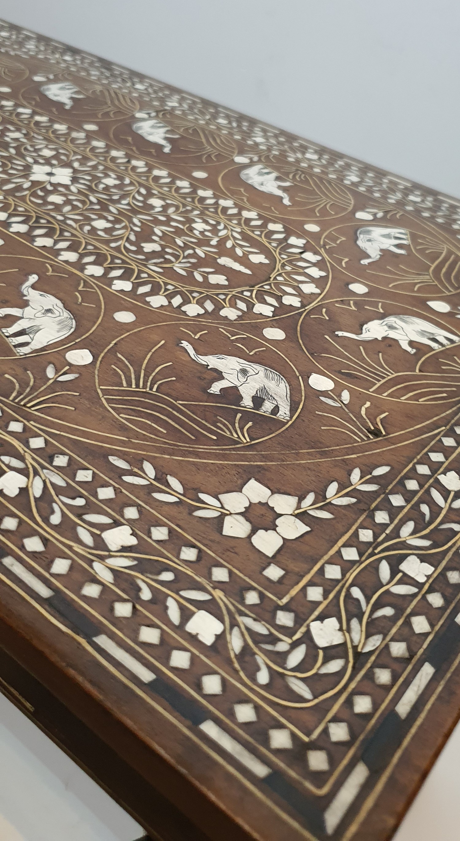 An antique Indian side table inlaid with with ivory on elephant head shape supports. The table has a - Image 4 of 5
