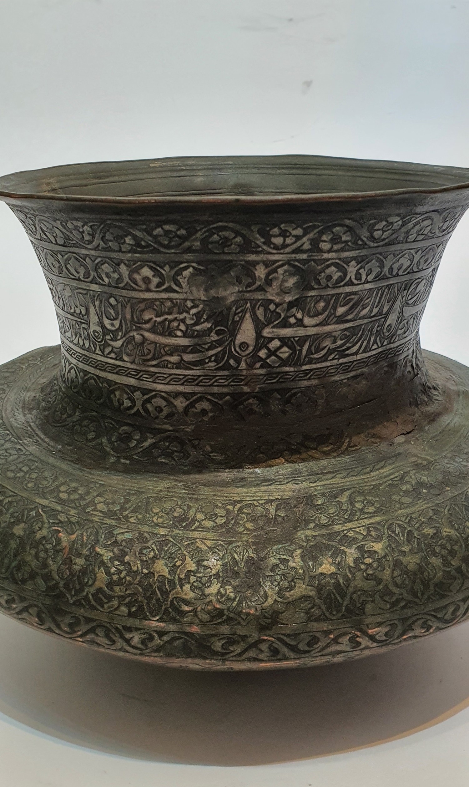 A 17th century Safavid brass vase with calligraphic engraved design. H18.5cm. - Image 2 of 5