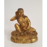 A 19th century Tibetan Milaraspa gilded bronze Buddha statue. H.15xW.13cm