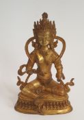 A 19th Tibetan century gilded bronze Buddha sitting on a lotus flower base. H.23xW.15cm