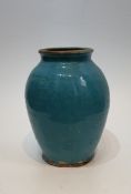 A 12th Century Islamic blue glaze ceramic jar. Unglazed lip and foot. H.25xW.18cm