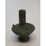 A Bactrian bronze cosmetic bottle, circa 2500 BC. H.11xW.8cm