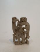 A Chinese white jade dragon and bird pierced carving. H.8cm