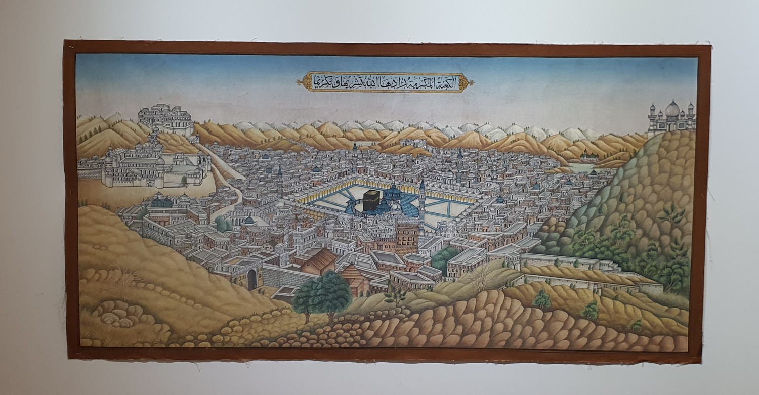 A 19th century finely painted unusual bird's-eye view of the Qa'ba and the city of Mecca on