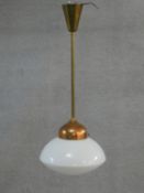 A mid century vintage copper ceiling pendant lamp with globular milk glass shade. H.75cm