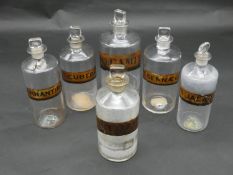 A miscellaneous collection of six 19th century apothecary's jars with stoppers, various labels, some