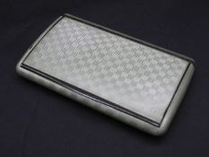 An antique pale green Guilloche enamel engine turned cross hatched design silver card case.