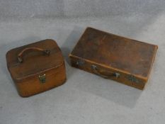 A vintage leather vanity case and a similar documents case. H.11 L.45 W.28cm