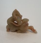 A Chinese carved jade deer and foliage figure. L.9.5xW.7cm