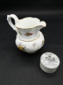 An antique ceramic transferware Burgess`s Anchovy Paste jar and cover along with a hand painted