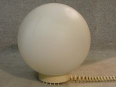 Appareil Lita, France, a vintage white frosted glass globe desk light with spiral chord. Makers