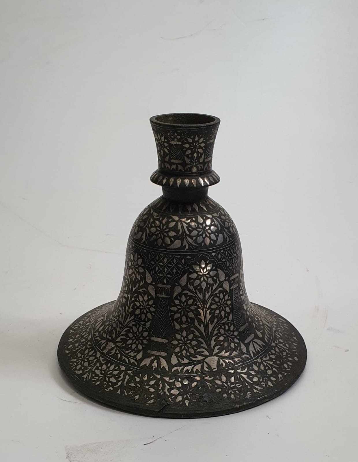 A 19th century Indian Bidriware hookah base. With inlaid floral design. H16cm.