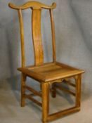 A Chinese carved hardwood side chair with panel seat on stretchered supports. H.114cm