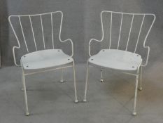 A pair of C.1950 Ernest Race antelope chairs, seats in moulded and laminated plywood. H.80cm