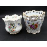 Two antique porcelain hand painted floral design cachepots. One Dresden, with a pierced scrolling