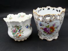 Two antique porcelain hand painted floral design cachepots. One Dresden, with a pierced scrolling