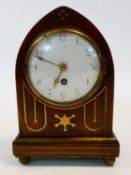 A Regency lancet bracket clock in brass inlaid mahogany case with white enamel dial and Arabic