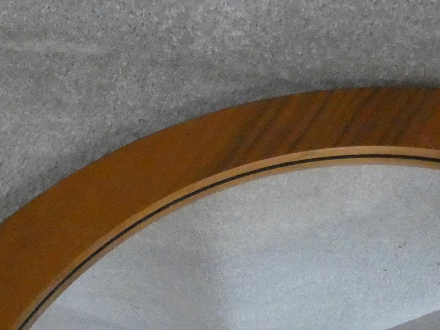A contemporary wall mirror with off set circular plate. D.75cm - Image 3 of 4