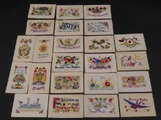 A collection of twenty three silk hand embroidered WW1 souvenir postcards. Some as envelopes with
