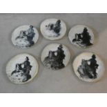 Six studio pottery plates with transfer design of Dresden porcelain figures, with white glaze